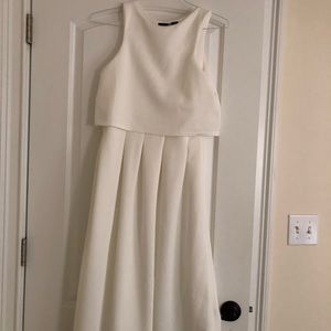 sleeveless white midi dress.